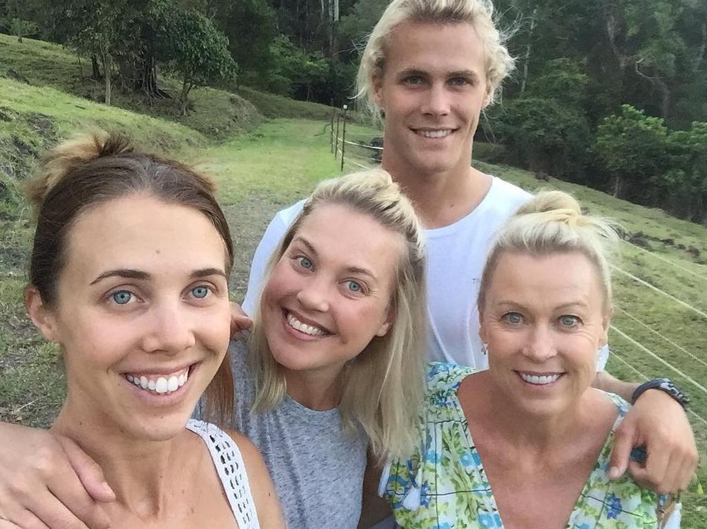 Jaimi Kenny (second left), brother Jett (second right) and sister Morgan (left), and mum Lisa Curry. She is the daughter of swimming champ Lisa Curry and ironman great Grant Kenny – Picture: Jett Kenny/ Instagram