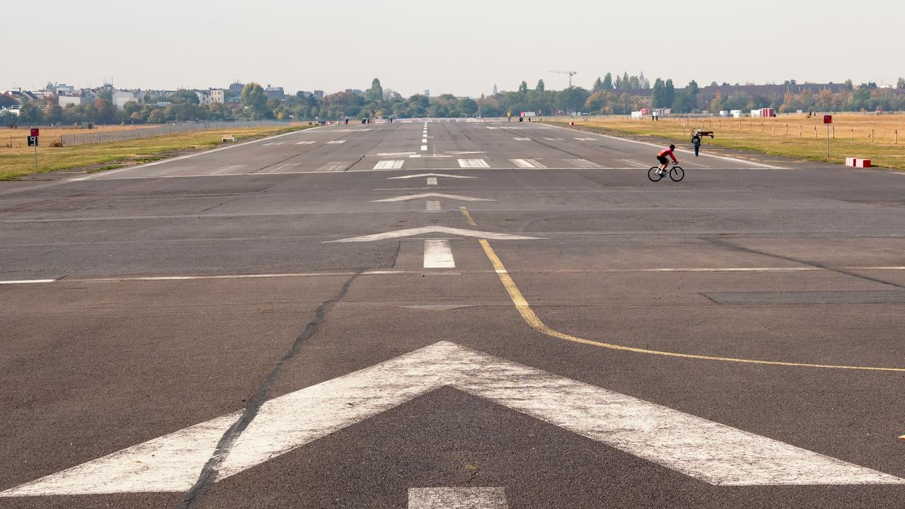 Former takeoff runway in public city park Tempelhofer Feld, former Tempelhof Airport in Berlin, Germany