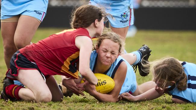 Matilda Lynn and Quin Neyland in the match between SA and NSW on day one of the SSA U12 Australian Football Championships. Picture: Matt Loxton