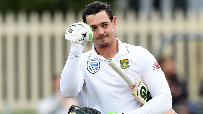 South Africa's Quinton de Kock celebrates after reaching his hundred.