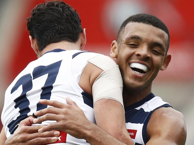 GEELONG, AUSTRALIA - APRIL 24: Sam Simpson of the Cats (L) celebrates a goal with Stefan Okunbor of the Cats during the match between the NAB AFL Academy and the Geelong Cats VFL side at GMHBA Stadium on April 24, 2021 in Geelong, Australia. (Photo by Daniel Pockett/AFL Photos/via Getty Images)