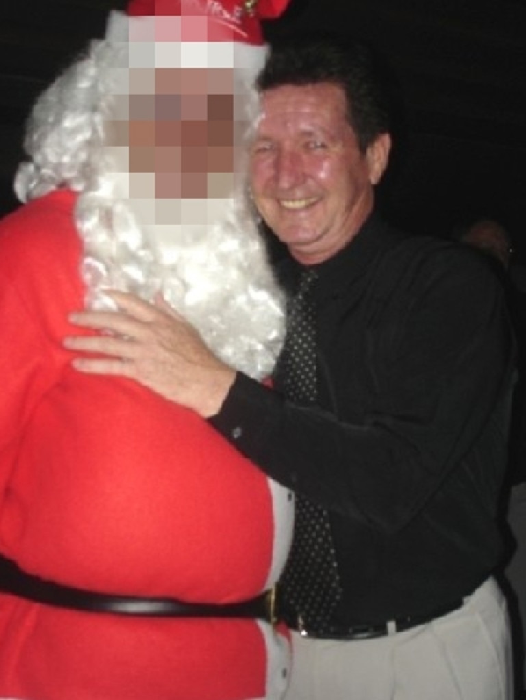 Kevin Correll with Santa at a Mingles Singles Christmas Party in 2006.