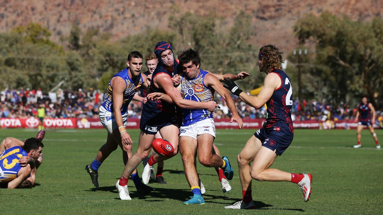 Angus Brayshaw attempts to slow down star Eagle Andrew Gaff. Picture: Getty Images