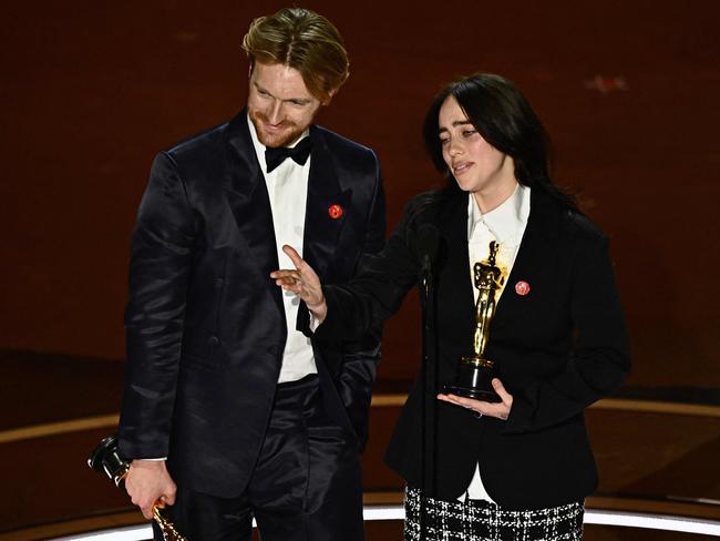 US singer-songwriter Billie Eilish and US singer-songwriter Finneas O'Connell accept the award for Best Original Song. Picture: AFP