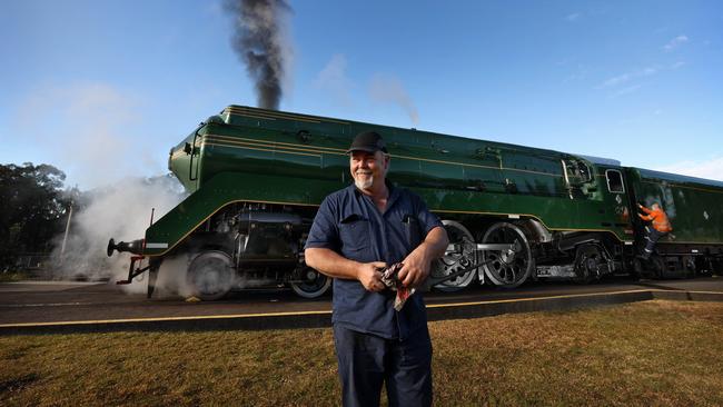 Transport Heritage NSW workshop manager Ben Elliot with the Australian-built 3801 Newcastle Flyer steam engine on Saturday. Picture: Dylan Coker