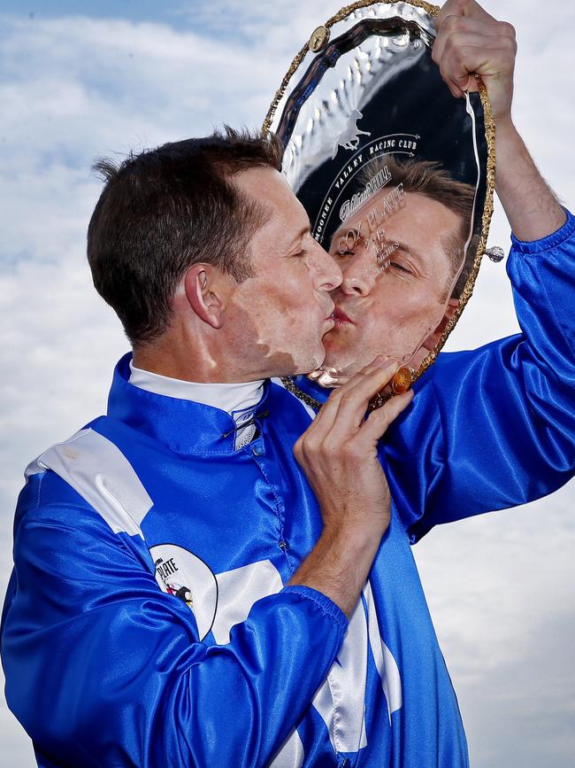 Bowman kisses his first Cox Plate in 2015.