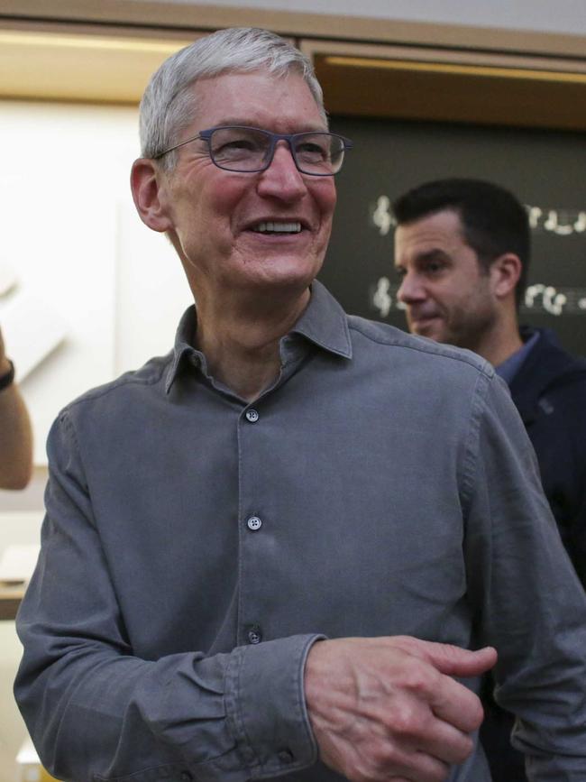 Apple CEO Tim Cook walks through the newly renovated Apple Store at Fifth Avenue in New York. Picture: AFP