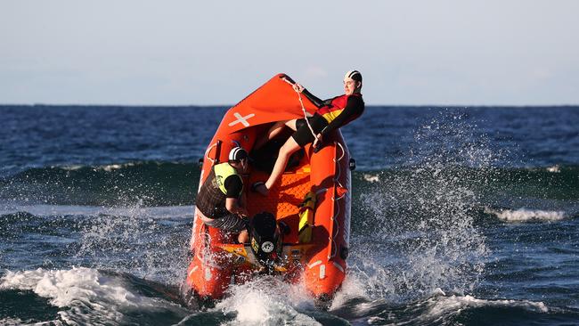 Broadbeach SLSC IRB team members Callum Tuohy ( driver ) and Paul Ryan are ready for the Queensland IRB Ocean Roar comp. Photograph : Jason O'Brien