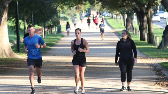 Melburnians will not be allowed to jog with more than one friend from outside of the house after the region heads back into strict lockdown tonight. Picture: David Crosling