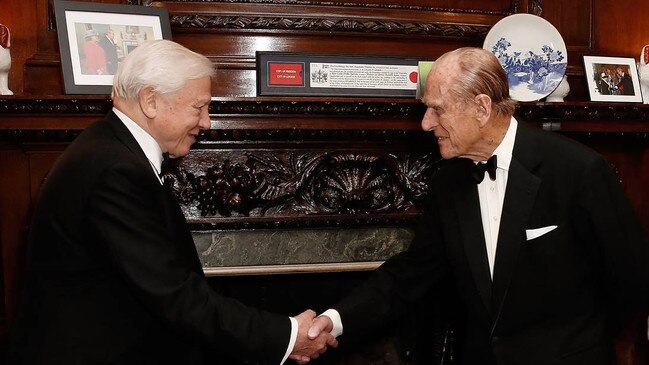 His Royal Highness the Duke of Edinburgh congratulates Sir David Attenborough in 2015 for his work on a doco on the Great Barrier Reef.