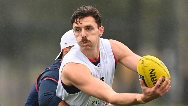 Jake Lever shoots out a handball. Picture: Getty Images