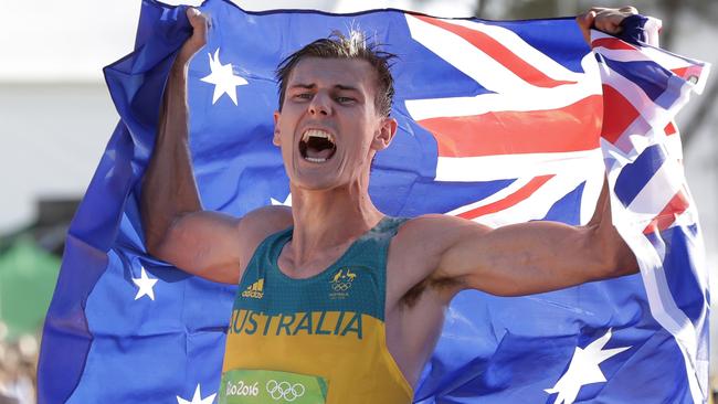 Dane Bird-Smith celebrates his bronze medal performance in the Mens 20k race walk.