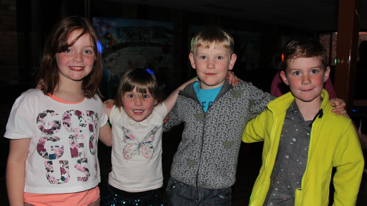 Bella De Percy, Jessica Ellis, Sam Ellis and Cooper De Percy catch up at the Blue Light Disco last Friday night. Photo Erin Smith / Stanthorpe Border Post