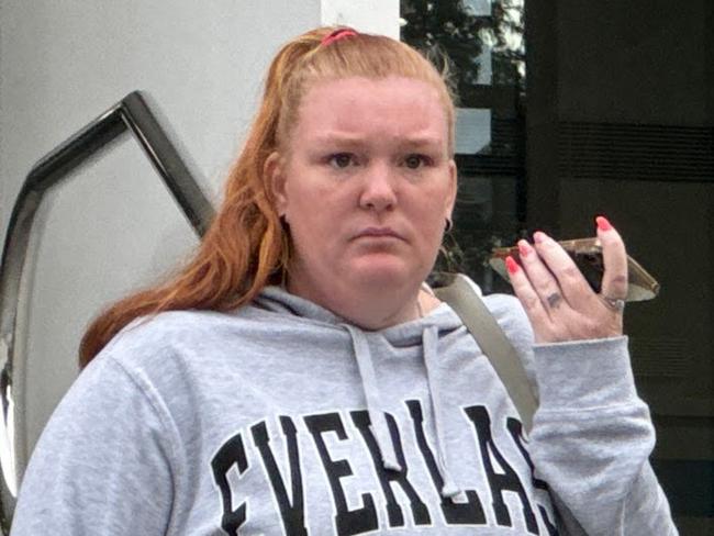 Queensland woman Kirsten Anthony (grey jumper) leaving Wollongong Local Court on Tuesday July 30 2024. First appearance after being charged with negligent driving occasioning death. Crashed into her friend Hayden Errol Frank Selby on Mount Ousley on Friday July 19 2024. Picture: Dylan Arvela