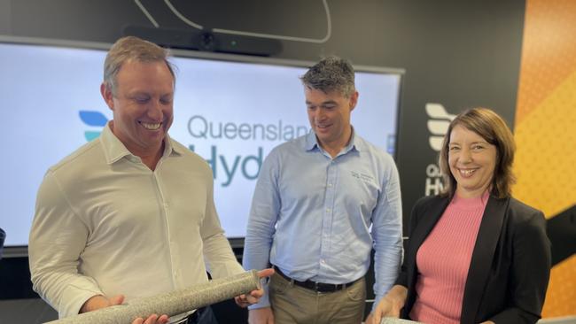 Queensland premier Steven Miles, Queensland Hydro executive manager Chris Evans, and Labour candidate for Mackay Belinda Hassan with granite samples from the site of the Pioneer-Burdekin pumped hydro scheme on August 9 in Mackay. Photo: Zoe Devenport