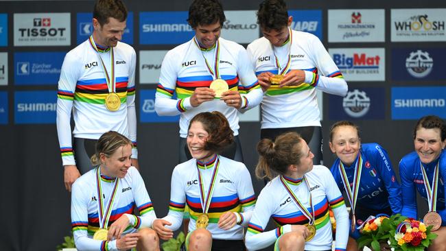 ZURICH, SWITZERLAND - SEPTEMBER 25: Gold medalists Michael Matthews, Ben O'connor, Jay Vine, Grace Brown, Brodie Chapman, Ruby Roseman-Gannon of Team Australia and Bronze medalists Elisa Longo Borghini and Gaia Realini of Team Italy pose on the podium during the 97th UCI Cycling World Championships Zurich 2024, Mixed Relay Team Time Trial a 53.7km one day race from Zurich to Zurich on September 25, 2024 in Zurich, Switzerland. (Photo by Tim de Waele/Getty Images)