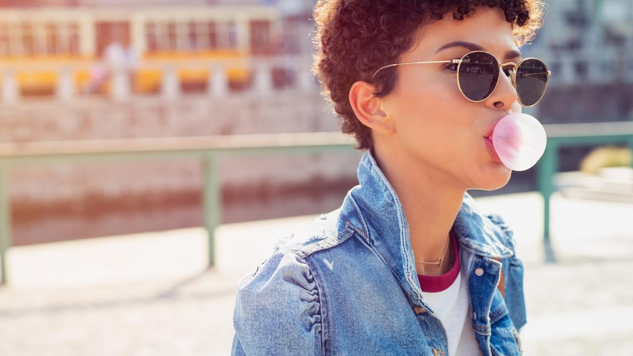 Stylish brazilian girl with bubble gum