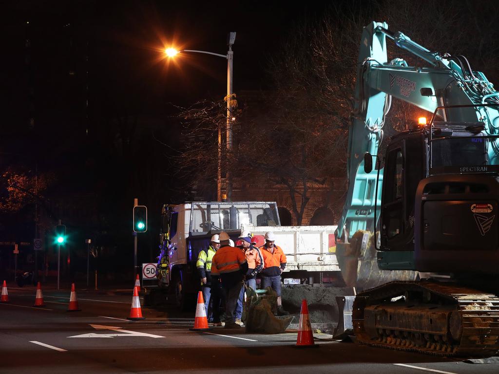 Work in Macquarie Street, Hobart, on the hole that will house the chamber performance artist Mike Parr will live in for 72 hours during Dark Mofo. Picture: NIKKI DAVIS-JONES