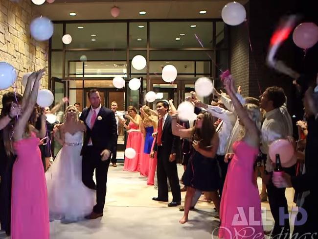 Texas couple Hana Noland and Tyler Noland are all smiles as their wedding draws to a close. Picture: YouTube