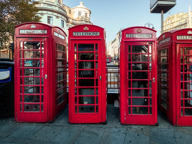 Red telephone box row in London, UK.