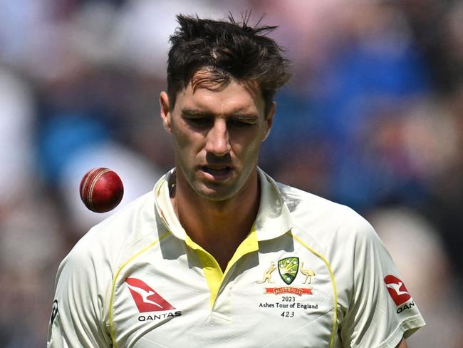 Australia's Pat Cummins prepares to bowl on day three of the fourth Ashes cricket Test match between England and Australia at Old Trafford cricket ground in Manchester, north-west England on July 21, 2023. (Photo by Oli SCARFF / AFP) / RESTRICTED TO EDITORIAL USE. NO ASSOCIATION WITH DIRECT COMPETITOR OF SPONSOR, PARTNER, OR SUPPLIER OF THE ECB