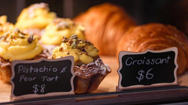 Freshly baked croissants and a pistachio and pear tart in the busy pop-up Six Russell Bakes at Area 2BE, in Sandy Bay. Picture: Linda Higginson