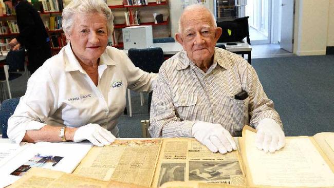 50-YEAR HISTORY: Councillor Rose Swadling with Col Hamilton and his collection of scrapbooks he has donated to the library. Picture: Allan Reinikka Rokascrapbooks