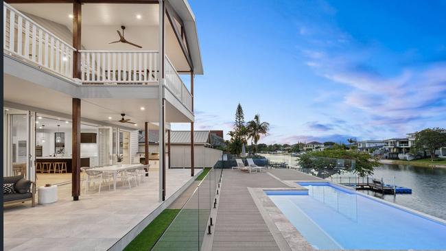 An interstate buyer desperate to secure this Mermaid Waters house ahead of auction made a successful offer of $4.35 million, smashing the suburb record by $50,000