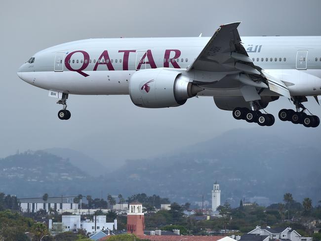 A Qatar Airways aircraft, flight 739 from Doha, comes in for a landing at Los Angeles International Airport. Picture: Frederic J Brown/AFP