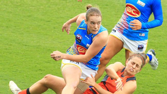 Brittany Perry of the Suns kicks the ball during the round one AFLW match (Photo by Mark Evans/Getty Images)