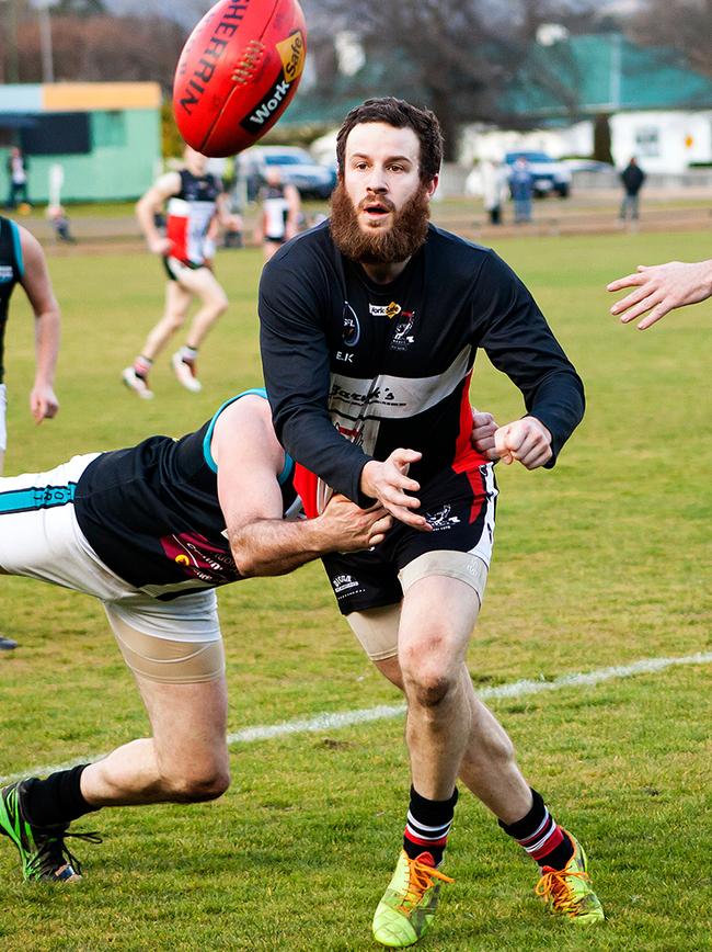 Caden Wilson in action for New Norfolk v Cygnet at Boyer Oval.