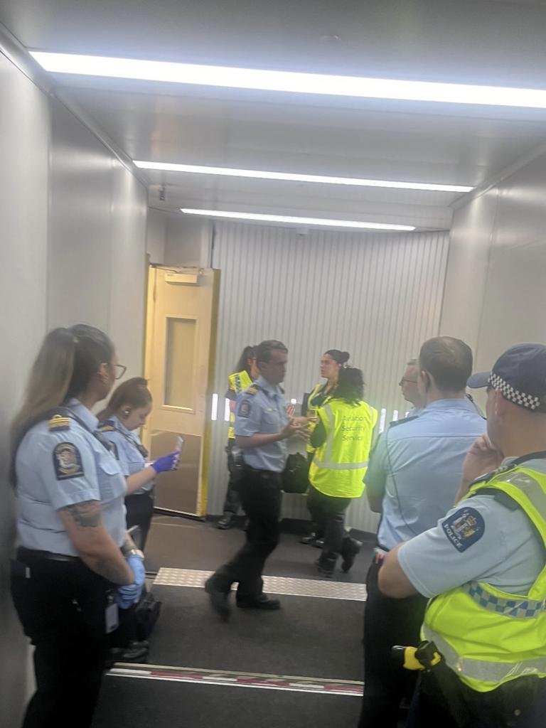 There were several emergency service crews on site as shocked passengers exited the plane in Auckland. Picture: Brian Jokat