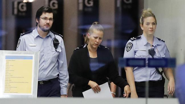 Heidi Strbak (centre) leaving the Supreme Court following her resentencing for the manslaughter of her son, Tyrell Cobb. Picture: NCA NewsWire / Josh Woning.