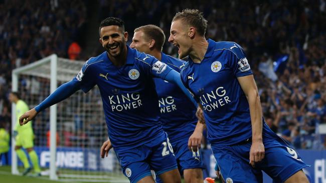 Leicester City's English striker Jamie Vardy (R) celebrates with Leicester City's Algerian midfielder Riyad Mahrez (L) after scoring during the English Premier League football match between Leicester City and Everton at King Power Stadium in Leicester, central England on May 7, 2016. / AFP PHOTO / ADRIAN DENNIS / RESTRICTED TO EDITORIAL USE. No use with unauthorized audio, video, data, fixture lists, club/league logos or 'live' services. Online in-match use limited to 75 images, no video emulation. No use in betting, games or single club/league/player publications. /