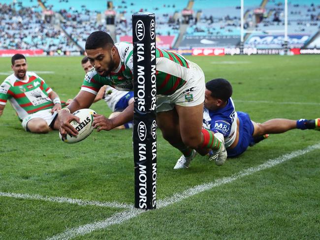 Robert Jennings dives over to score one of his three tries for the game. Picture: Getty Images