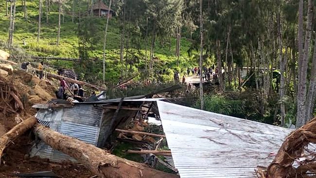 A demolished house at the site of a landslide at Yambali Village. Picture: AFP