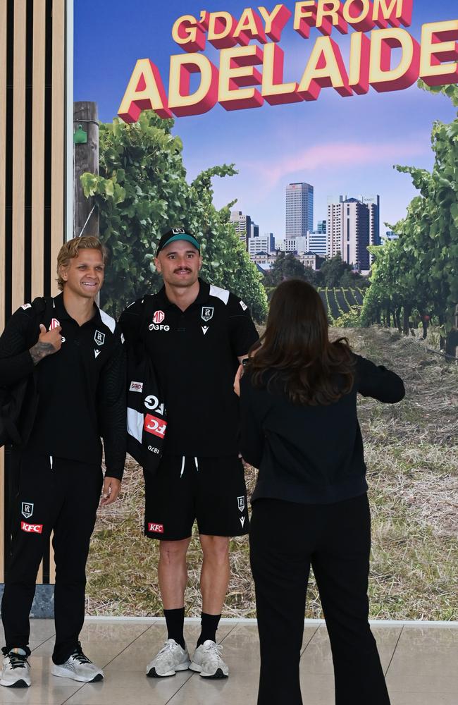 Powell-Pepper with Quinton Narkle as the Power flew to Sydney for last season’s preliminary final. Picture: Naomi Jellicoe