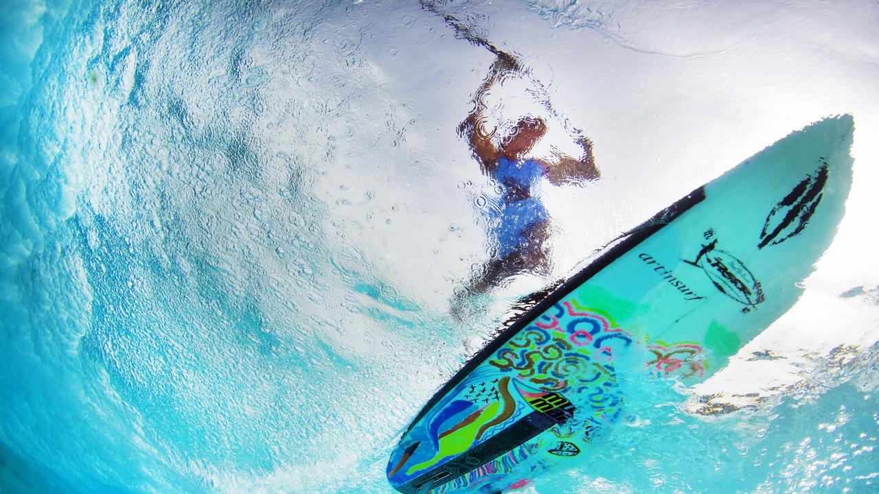 Felicia McCloud tests out her new Stand up Paddle board at Kingscliff during the Easter Holidays Photo Scott Powick