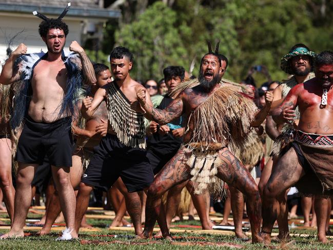 WAITANGI, NEW ZEALAND - FEBRUARY 05: Maori warriors prepare to welcome the New Zealand government representatives including Prime Minister Christopher Luxon at Te Whare RÃÂ«nanga during a pÃÂwhiri on February 05, 2024 in Waitangi, New Zealand. The Waitangi Day national holiday celebrates the signing of the treaty of Waitangi on February 6, 1840 by Maori chiefs and the British Crown, that granted the Maori people the rights of British Citizens and ownership of their lands and other properties. (Photo by Fiona Goodall/Getty Images)