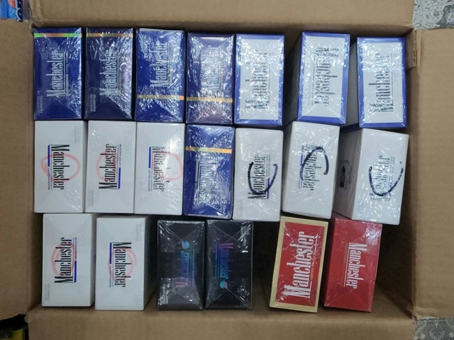 During the search warrants strike force officers located and seized large amounts of illicit tobacco products, nunchaku, three slingshots, and five batons. Picture: NSW Police