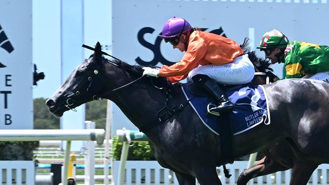 El Morzillo storms over the top of her rivals to win the QTIS 2YO Handicap for jockey Cejay Graham. Picture: Grant Peters - Trackside Photography