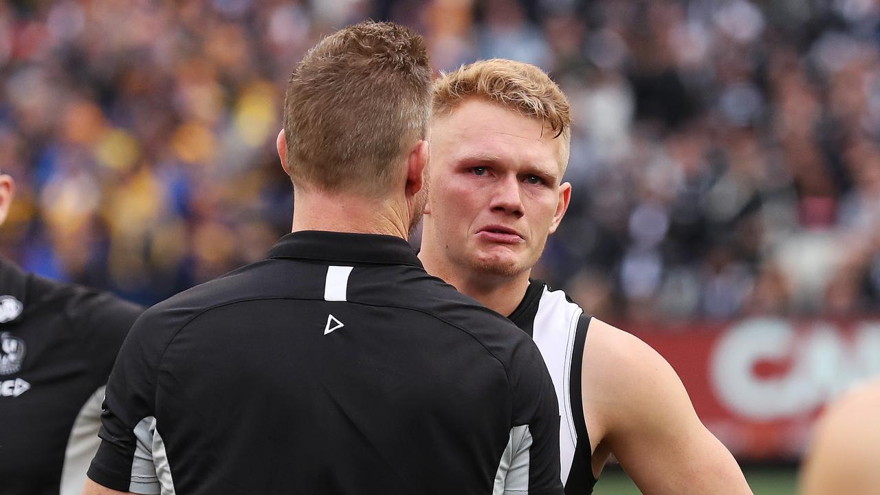 Adam Treloar and Collingwood coach Nathan Buckley after the Grand Final loss.