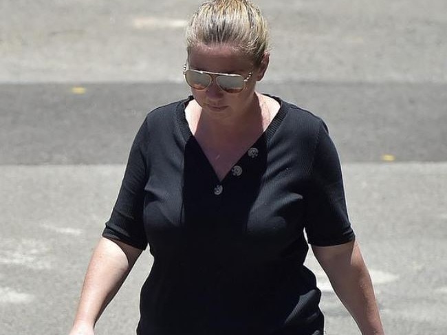 Laura Peverill leaving Townsville watch house, after being charged with manslaughter over the death of a three year old girl in a car. PICTURE: MATT TAYLOR.