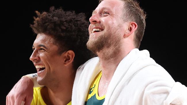 Thybulle (left) with fellow Aussie Olympian Joe Ingles. (Photo by Gregory Shamus/Getty Images)