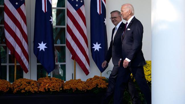 Anthony Albanese walks with US President Joe Biden to the White House’s Oval office. <span>Picture: AFP</span>