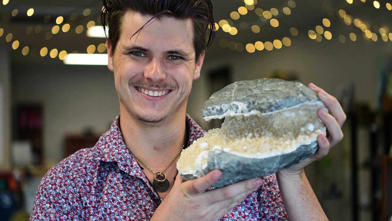 Michael Boon holding an Okenite and Apophyllite Cave which was found in India. Picture: Mike Knott