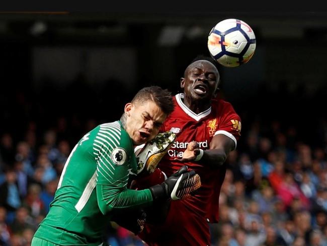 Ederson studded in the face by Sadio Mane.