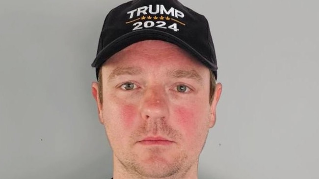 The man wearing his Trump cap