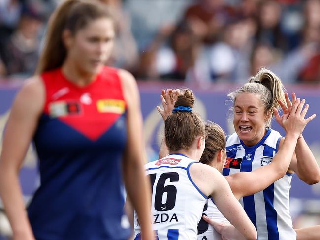 MELBOURNE, AUSTRALIA - NOVEMBER 12: Alice O'Loughlin of the Kangaroos (right) celebrates a goal during the 2023 AFLW Second Qualifying Final match between The Melbourne Demons and The North Melbourne Tasmanian Kangaroos at IKON Park on November 12, 2023 in Melbourne, Australia. (Photo by Michael Willson/AFL Photos via Getty Images)