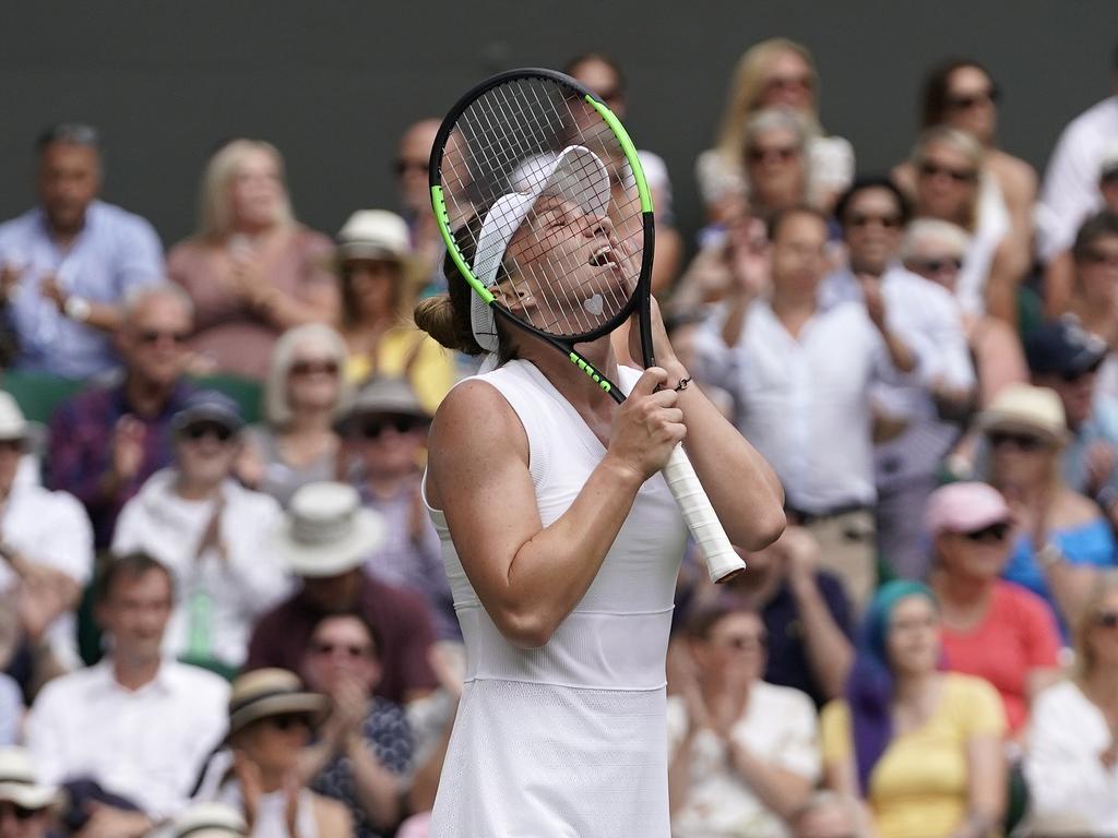 Romania's Simona Halep celebrates after beating Ukraine's Elina Svitolina. (Will Oliver/Pool Photo via AP)